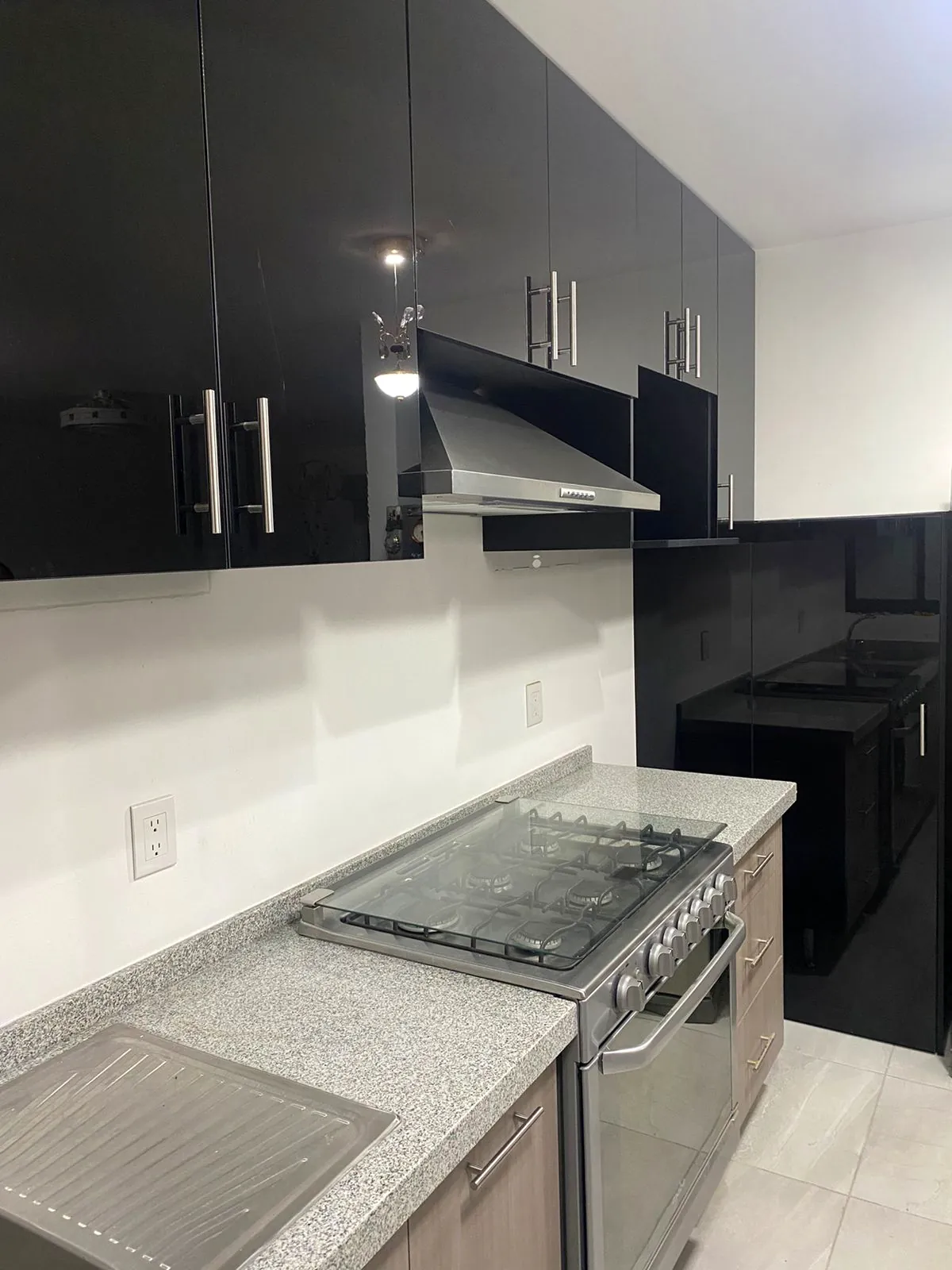 Cocina negra brillante a medida